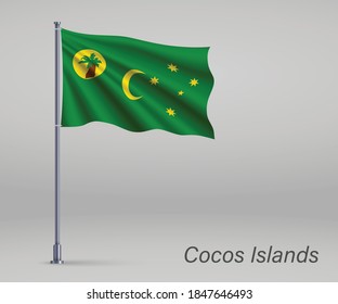 Waving flag of Cocos Islands - state of Australia on flagpole. Template for independence day