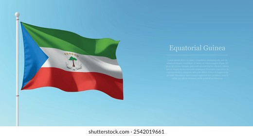 Waving flag of Equatorial Guinea on a pole with a blue sky backdrop with copyspace