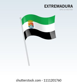 Waving flag of Extremadura the autonomous communities of Spain on gray background