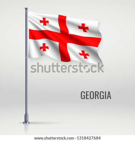Waving flag of Georgia on flagpole. Template for independence day poster design