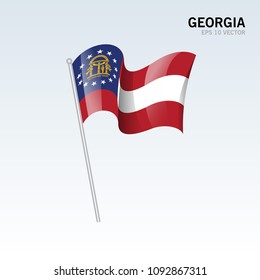 Waving flag of Georgia state of United States of America on gray background