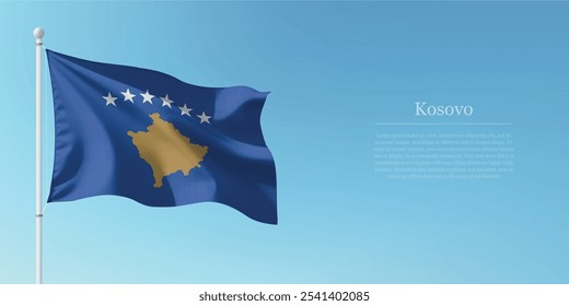 Waving flag of Kosovo on a pole with a blue sky backdrop with copyspace