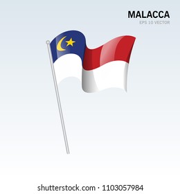 Waving flag of Malacca state and federal territory of Malaysia isolated on gray background