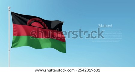 Waving flag of Malawi on a pole with a blue sky backdrop with copyspace