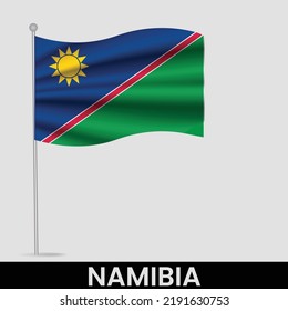 Waving flag of Namibia on flagpole. Template for independence day poster design
