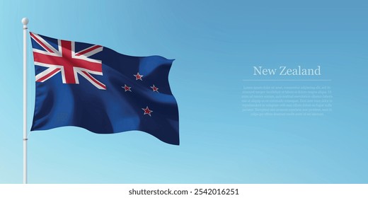 Waving flag of New Zealand on a pole with a blue sky backdrop with copyspace