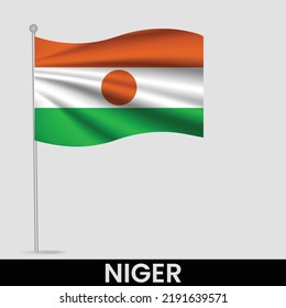 Waving flag of Niger on flagpole. Template for independence day poster design
