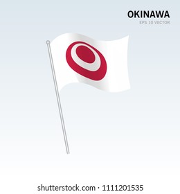 Waving flag of Okinawa prefectures of Japan isolated on gray background