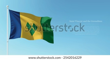 Waving flag of Saint Vincent and the Grenadines on a pole with a blue sky backdrop with copyspace