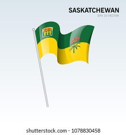 Waving flag of Saskatchewan provinces of Canada isolated on gray background