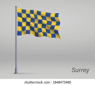 Waving flag of Surrey - county of England on flagpole. Template for independence day