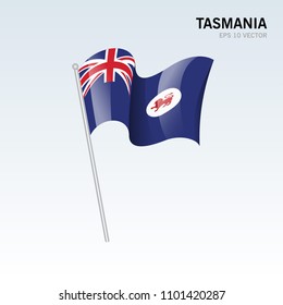 Waving flag of Tasmania states,territories of Australia on gray background