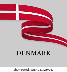 Waving ribbon or banner with flag of Denmark. Template for independence day poster design