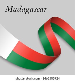 Waving ribbon or banner with flag of Madagascar. Template for independence day poster design