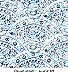 Wavy blue-white pattern. Vintage ornament painted by hand. Ethnic and tribal motifs. Vector illustration.