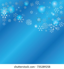 Wavy Christmas background with random scatter falling silver snowflakes, blue blurred lights and sparkles on a blue background