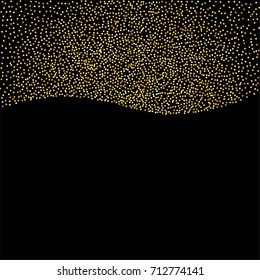 Wavy golden powder background of random scatter golden circles isolated on black.