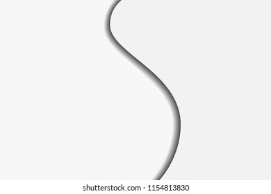 Wavy layer of white paper casting shadow above background