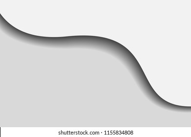 Wavy layer of white paper casting shadow over background
