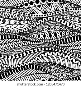 Wavy seamless ethnic pattern. Black and white print for textiles hand-drawn in the style of doodle. Aztec and tribal motifs. Vector illustration.