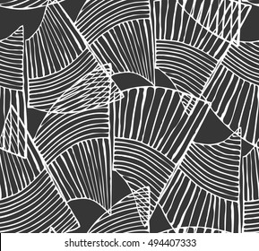 Wavy trapezoids white on black pattern.Hand drawn with ink seamless background.Rough hand  sketched texture created with hatched geometric shapes. Black and white seamlessly repeating ornament.