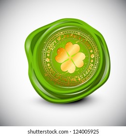 Wax seal for St. Patrick's Day with golden clover leaf. EPS 10.