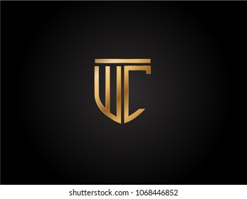 WC shield shape Letter Design in gold color