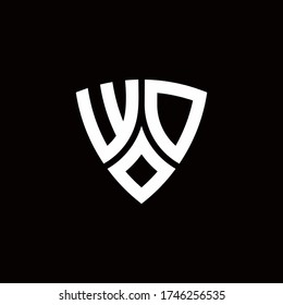 WD monogram logo with modern shield style design template isolated on black background