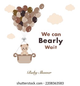 We can bearly wait text with teddy bear and hot air balloon. Baby shower greeting card with teddy bear and balloon greeting card.