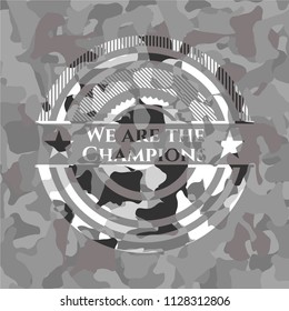 We are the Champions on grey camouflaged texture