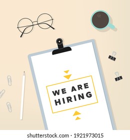 We are hiring. Clipboard, eyeglasses, coffee cup and stationery objects on desk. Vector illustration, flat design