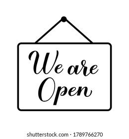 We are open calligraphy hand lettering isolated on white. Re-opening of shops, services, restaurants, barbershops, hair salons after quarantine.  Welcome sign for customers. Vector banner.
