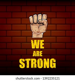 We are strong concept illustration with rised fist in the air isolated on brick wall background. Motivational slogan