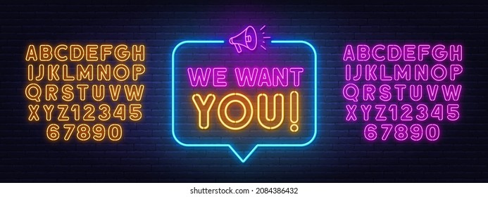 We want you neon sign in the speech bubble on brick wall background.