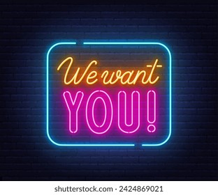 We want you neon sign on brick wall background.