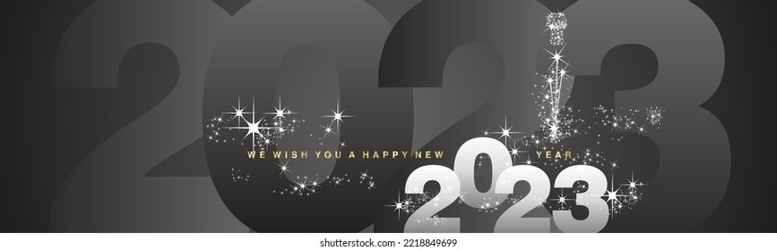 We wish you a Happy New Year 2023. Sparkler firework over 2023 numbers in background. Silver white black greeting card