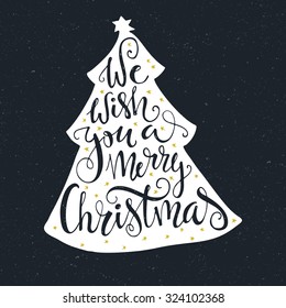 We Wish you a merry christmas - quote in a christmas tree. Unique handdrawn typography poster. Vector art. Great design element for congratulation cards, banners and flyers.