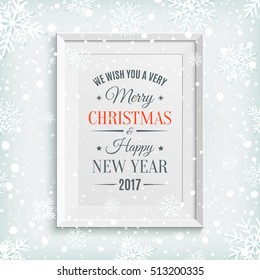 We Wish You Merry Christmas and Happy New Year 2017 greeting card, brochure or poster template with snow and snowflakes. Winter background. White picture frame. Vector illustration.