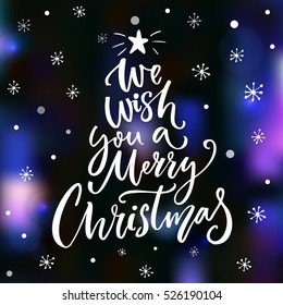 We wish you a Merry Christmas text. Greeting card design. Brush vector lettering photo overlay.