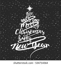 We Wish You A Merry Christmas And Happy New Year Typographical Background On beautiful dark background