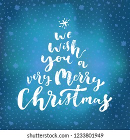 We Wish You A Very Merry Christmas hand lettering. Merry Christmas calligraphic phrase. Hand lettered Christmas greeting card. Ink brush modern calligraphy. Hand written holiday quote. Vector graphics