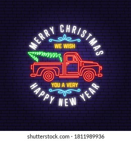 We wish you a very Merry Christmas and Happy New Year neon sign with classic red christmas truck. Vector. Vintage typographic design for xmas, new year emblem in retro style with pickup.