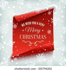 We wish you a Very Merry Christmas, greeting card. Red, curved, paper banner on winter background with snow and snowflakes. Vector illustration.