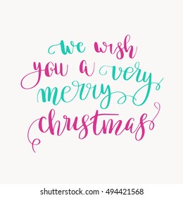 We wish you a very merry Christmas. Christmas greeting card with calligraphy. Handwritten modern brush lettering. pink and mint colors text quote on white background