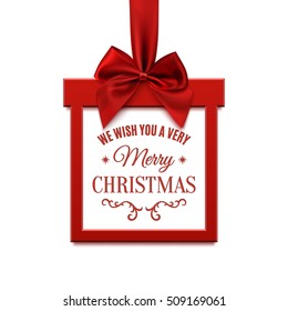 We wish you a very Merry Christmas, square banner in form of  gift with red ribbon and bow, isolated on white background. Brochure, greeting card or banner template. Vector illustration.