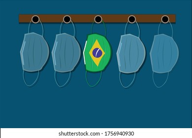Wear mask sign and symbol. Hanging masks on the wall. Brazil flag on the mask. Coronavirus in Brazil. coronavirus crisis. The spread of coronavirus in Brazil concept. Safe Brazil