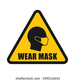 Wear mask warning triangle vector sign. Covid-19 social distancing and safety measures symbol. Coronavirus pandemic icon. Protective mask head silhouette.