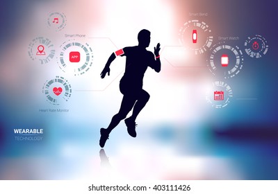 Wearable technology fitness tracker, smart phone, heart rate monitor and smart watch with man running silhouette in blur background