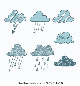 Weather. Cute clouds painted by hand. Vector set.