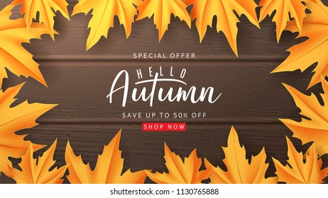 Web banner template for autumn sale. Vector illustration with calligraphy lettering. Maple leaves on the dark wooden texture.